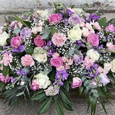 Pink, Lilac, and White casket spray 