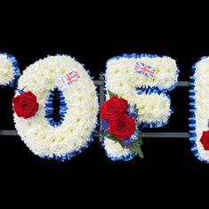 Massed lettering with British flags 